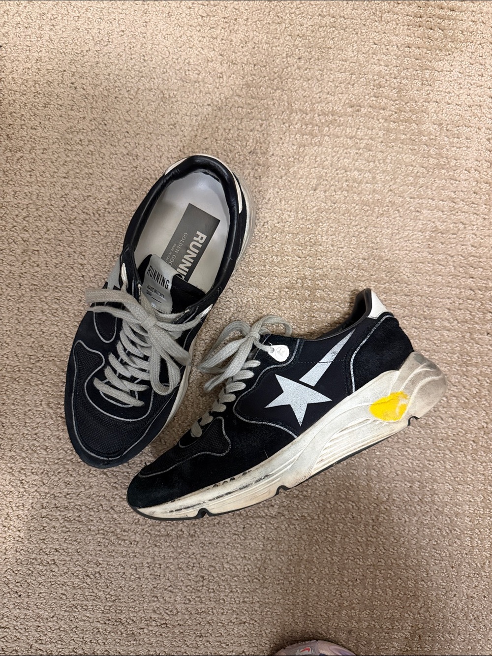 Golden Goose Black and White Star Sneakers with Yellow Accent